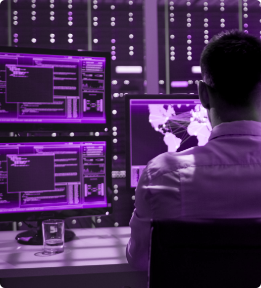 A person sitting in front of monitor